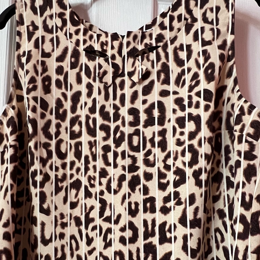 CAbi Animal Print Top.   .Size L